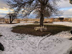 View of yard layered in snow