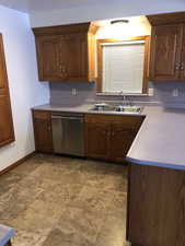 Kitchen with dishwasher and sink