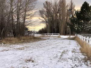 View of yard covered in snow