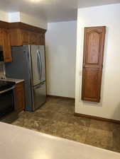 Kitchen with appliances with stainless steel finishes