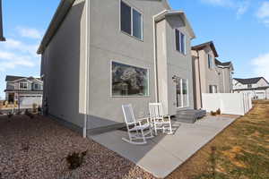 Rear view of house featuring a patio area