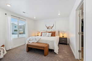 View of carpeted bedroom