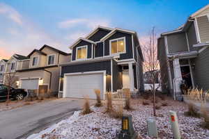 View of front facade with a garage