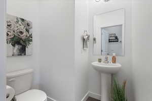 Bathroom with toilet and sink