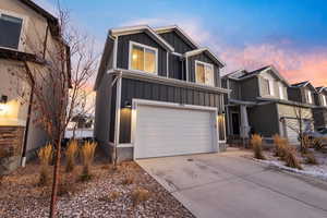 View of front facade with a garage