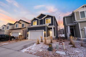 View of front facade with a garage