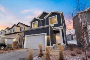 View of front of house with a garage