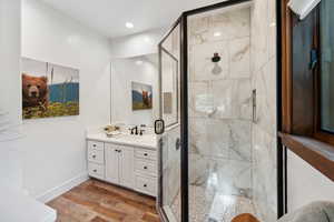 Bathroom featuring vanity and walk in shower