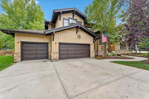 View of front of property featuring a garage