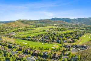 Aerial view featuring a mountain view