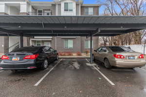 There is one covered designated parking spot, and also undesignated parking spot available per HOA rules.