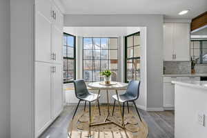 Dining space with light wood-type flooring