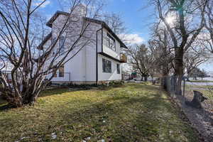 View of home's exterior featuring a yard