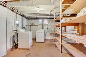 Basement featuring independent washer and dryer