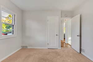 View of carpeted spare room