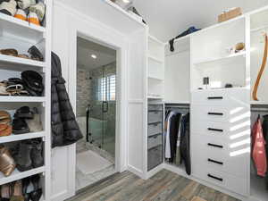 Primary Walk-In Closet w/vanity and natural light