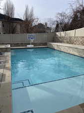 New Custom 18x26 Salt Water Pool with water falls, swim out shallow end for lounging and kids area.