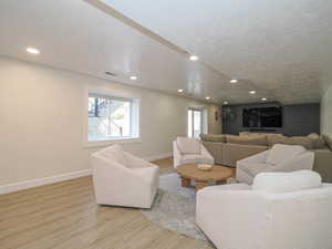 Daylight basement with sliding glass doors to backyard entertaining