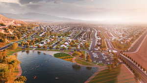 Aerial view at dusk with a water and mountain view