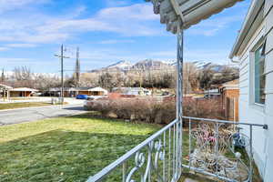 View of yard with a mountain view