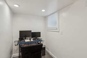 Office area with dark tile patterned flooring