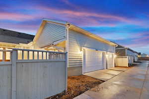 View of property exterior at dusk