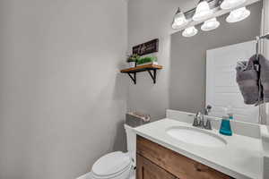 Bathroom with vanity and toilet