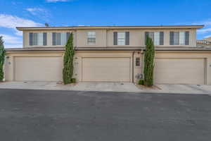 View of front of property with a garage