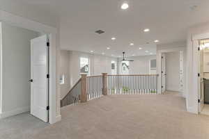 Interior space with light colored carpet