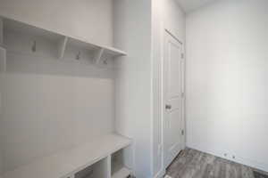 Mudroom featuring hardwood / wood-style flooring