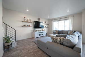 Living room featuring hardwood / wood-style flooring