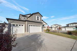 View of home's exterior featuring a garage