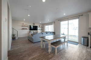 Dining room with hardwood / wood-style flooring