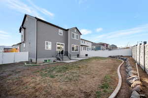 Back of property with a patio