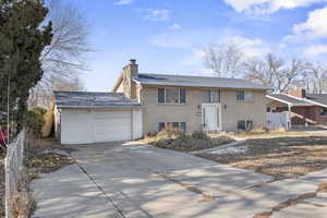 View of front of home with a garage