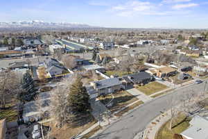 Birds eye view of property with a mountain view