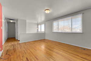 Unfurnished room featuring light hardwood / wood-style flooring