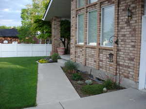 Exterior space with a lawn