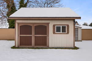 Shed with an abundance of space and has electricity wired to it.