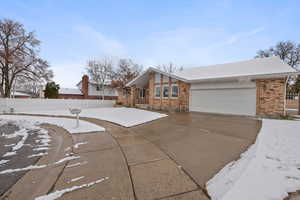 Ranch-style home with a garage