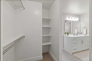 Bathroom featuring vanity and a textured ceiling