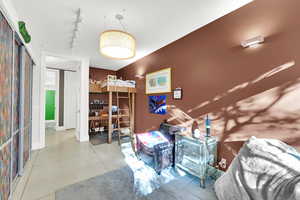 Interior space with track lighting