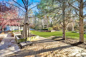 View of property's community featuring a yard