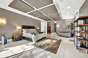 Bedroom with light tile patterned flooring