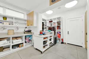 Interior space featuring light tile patterned floors