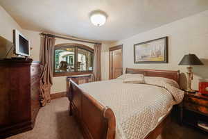 Bedroom featuring carpet flooring