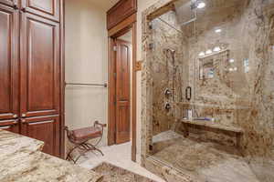 Bathroom with a shower with door