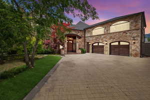 View of front of property with a garage