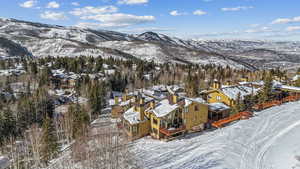 Snowy aerial view with a mountain view