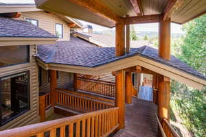 Wooden terrace featuring a mountain view